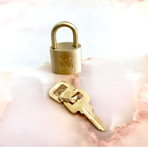 Louis Vuitton Accessories - Louis Vuitton lock and key set brass